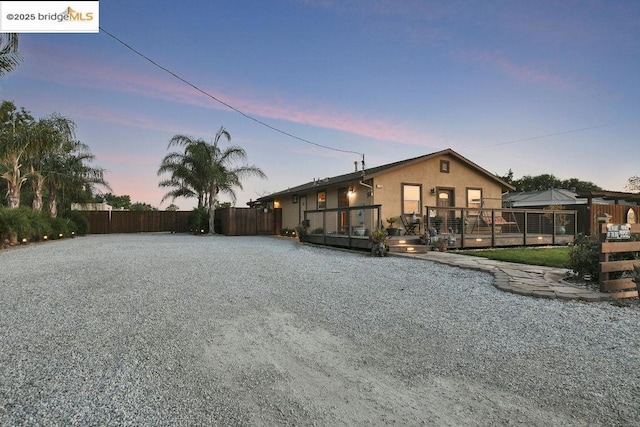 view of front of house with a deck