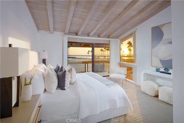 bedroom with access to outside, wood ceiling, and vaulted ceiling with beams