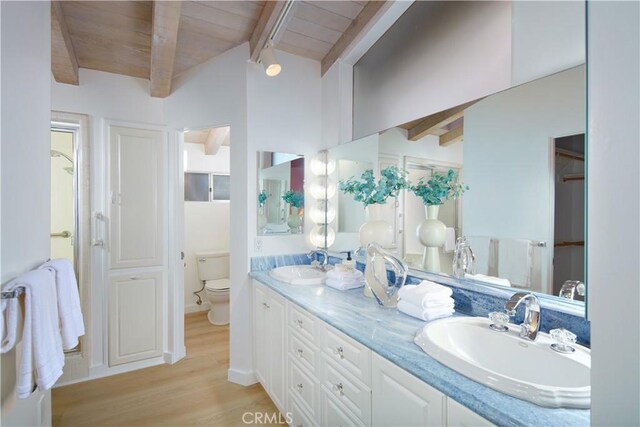 3024 Breakers Dr, Corona Del Mar, CA 92625 - bathroom featuring lofted ceiling with beams, a sink, toilet, wooden ceiling, and wood finished floors
