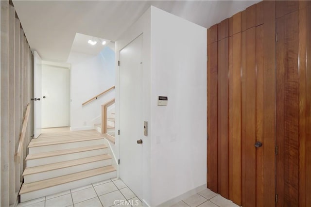 staircase with tile patterned flooring