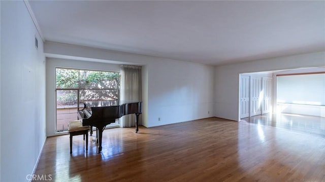 miscellaneous room featuring hardwood / wood-style floors