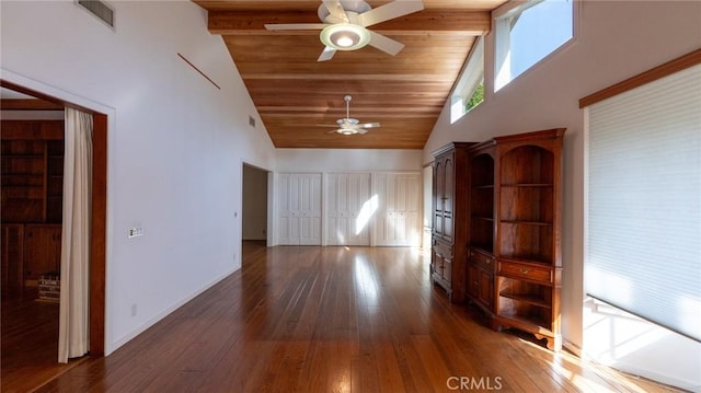 spare room with ceiling fan, dark hardwood / wood-style floors, and high vaulted ceiling