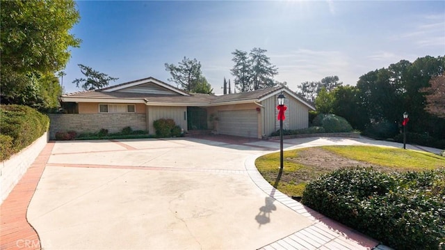 single story home featuring a garage