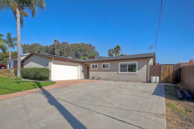 ranch-style house featuring a garage