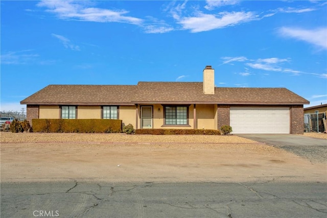 single story home with a garage