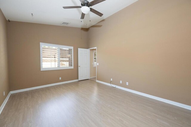 spare room featuring ceiling fan and light wood-type flooring