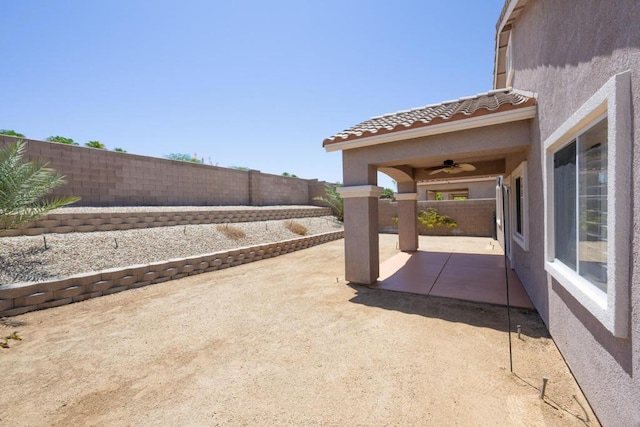 view of patio with ceiling fan