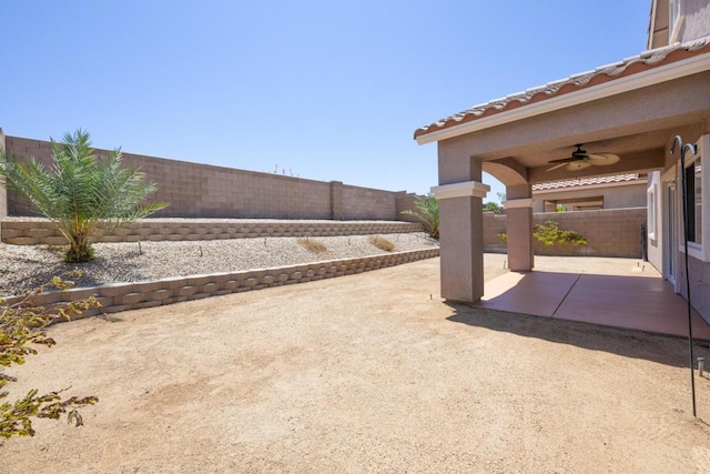 view of patio with ceiling fan