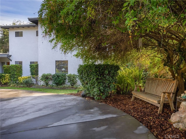 view of property exterior featuring a patio area