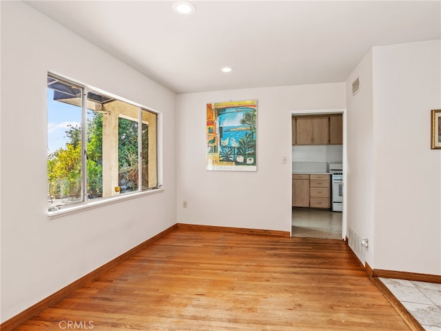 empty room featuring light hardwood / wood-style floors