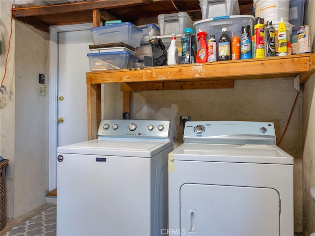 laundry room with washer and dryer