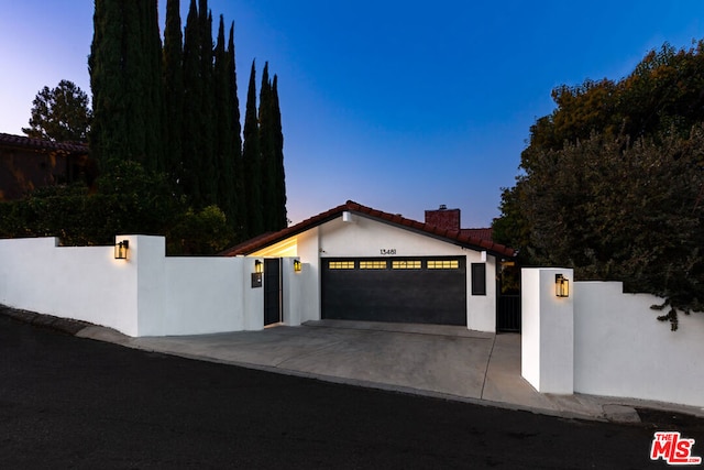 view of front of home featuring a garage