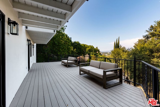 deck featuring an outdoor living space