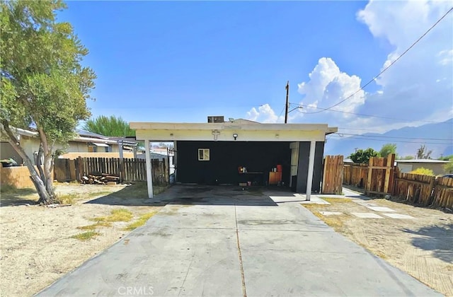 garage featuring a carport