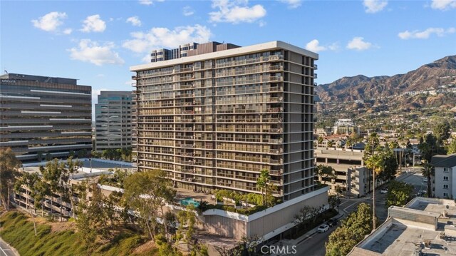 view of property with a mountain view