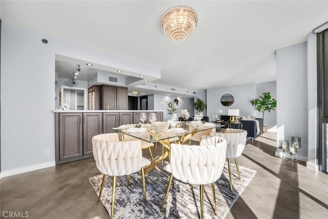 dining space with concrete floors