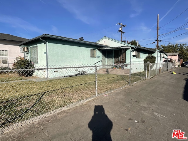 exterior space with a front yard