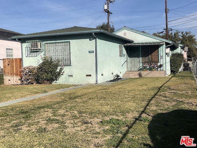 exterior space featuring a lawn