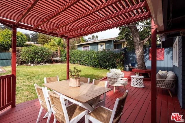 wooden terrace featuring a pergola and a yard