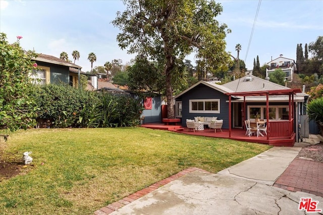 view of yard featuring an outdoor hangout area and a wooden deck