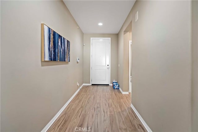 corridor featuring light wood-type flooring