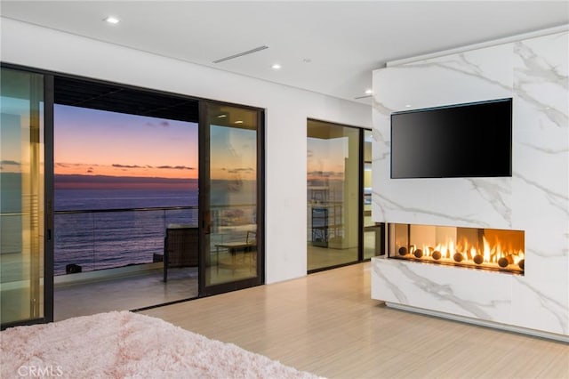 bedroom featuring access to outside, a fireplace, visible vents, and recessed lighting