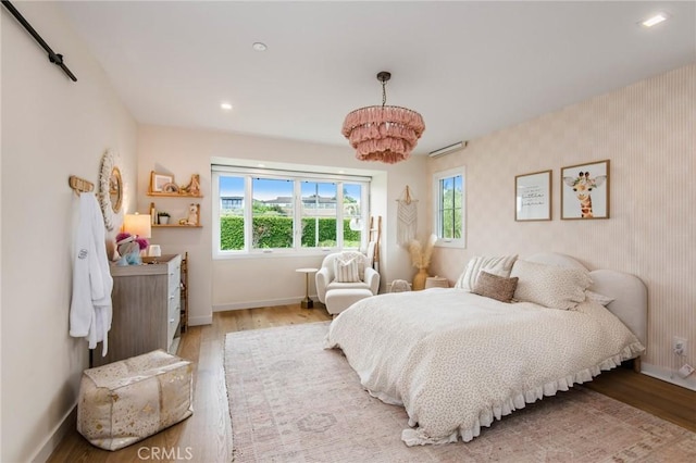 bedroom with light wood-type flooring