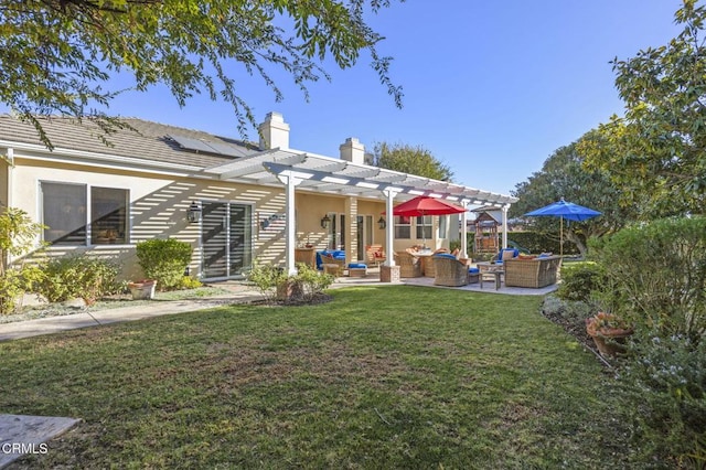 rear view of house with a lawn, a pergola, and outdoor lounge area