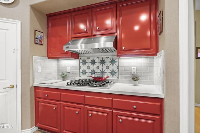 kitchen featuring tasteful backsplash and stainless steel gas stovetop