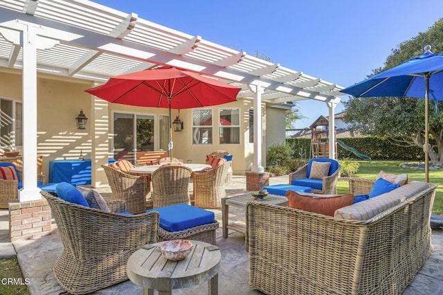 view of patio / terrace with a playground, an outdoor hangout area, and a pergola