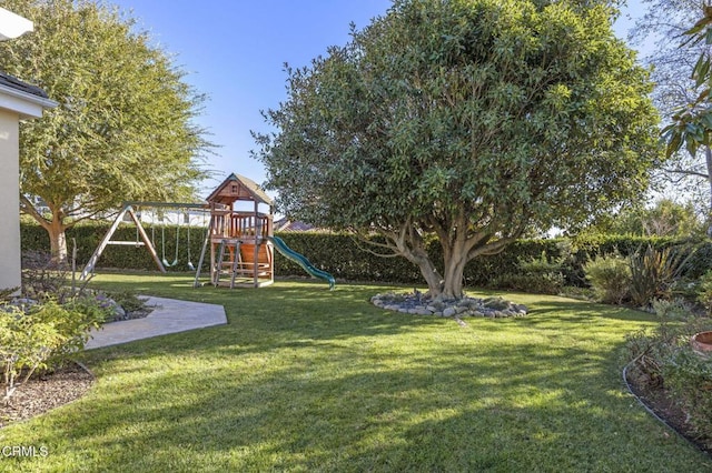 view of yard featuring a playground