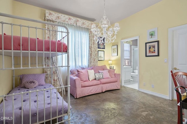 bedroom featuring ensuite bathroom, an inviting chandelier, and concrete flooring