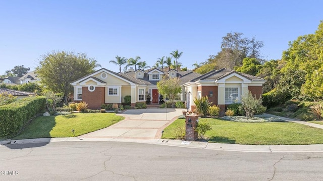 view of front of home with a front yard