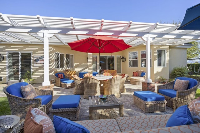 view of patio / terrace with an outdoor hangout area and a pergola