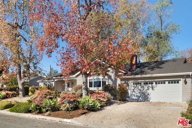 view of front of property featuring a garage