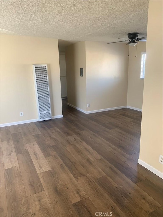 21834 Belshire Ave Unit 2, Hawaiian Gardens, CA 90716 - unfurnished room with dark wood-style floors, visible vents, a textured ceiling, and ceiling fan