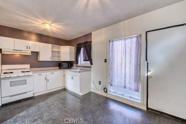 kitchen featuring white cabinetry, sink, ventilation hood, a textured ceiling, and white gas range oven