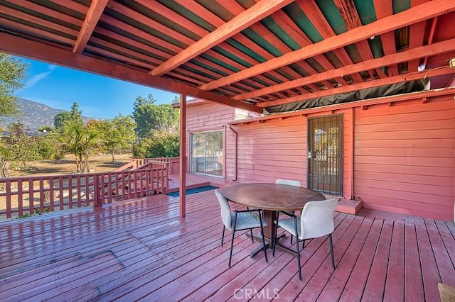 wooden terrace with a mountain view