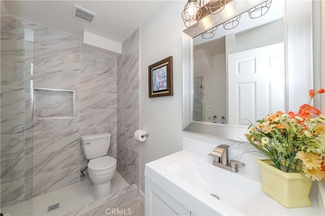 bathroom with a shower, tile walls, toilet, and vanity