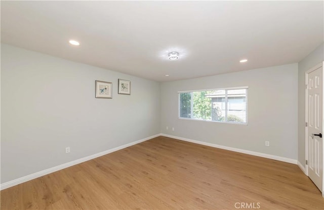 empty room featuring light hardwood / wood-style floors