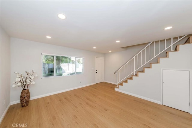 interior space with hardwood / wood-style flooring