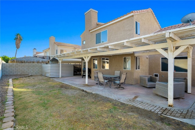 rear view of property with a patio area