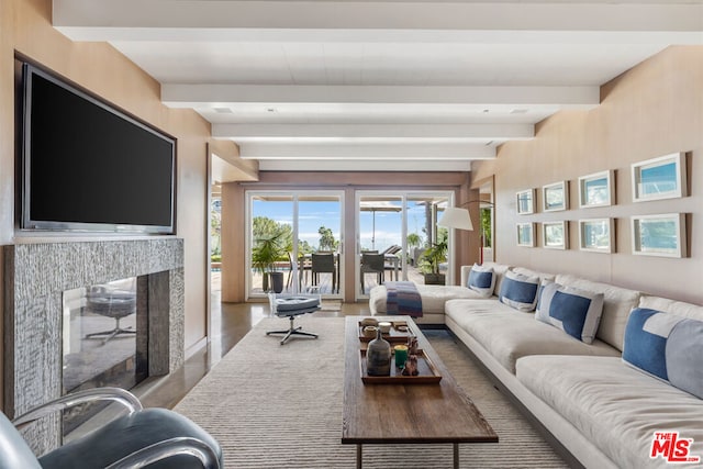 living room featuring hardwood / wood-style floors and beamed ceiling