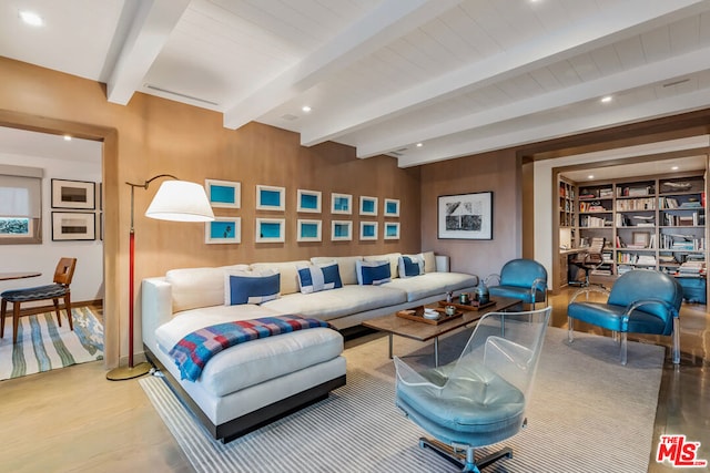 living room featuring built in features, wood-type flooring, wooden walls, and beamed ceiling