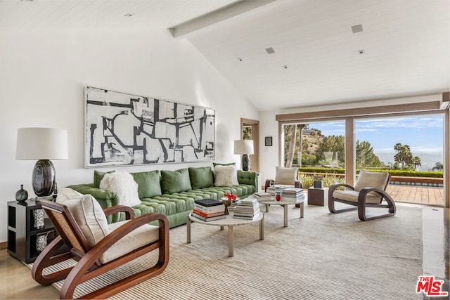 living room featuring high vaulted ceiling and beamed ceiling