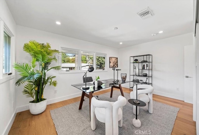 home office featuring light hardwood / wood-style flooring