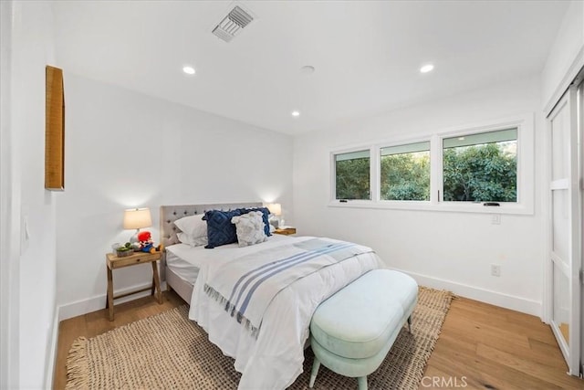 bedroom featuring hardwood / wood-style floors