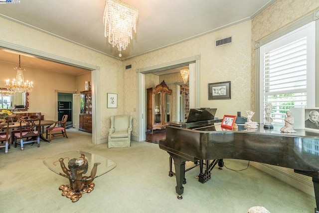 miscellaneous room with carpet floors, crown molding, and a chandelier