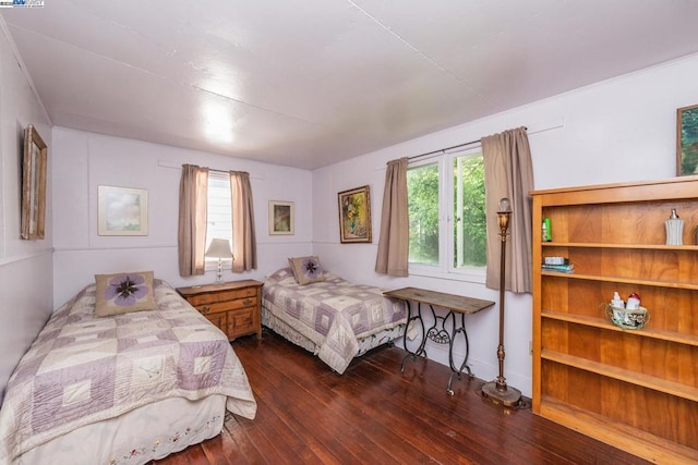 bedroom featuring dark hardwood / wood-style floors