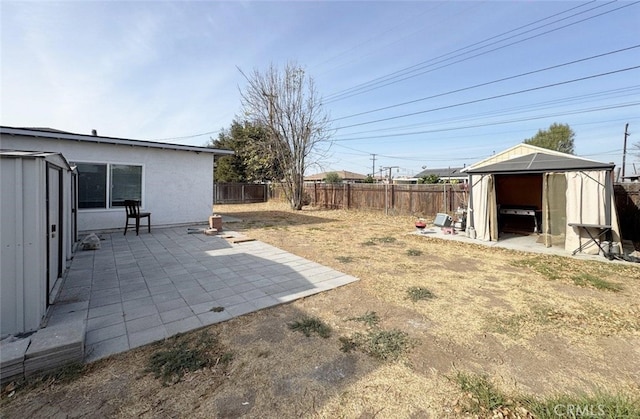 view of yard with a patio and a gazebo